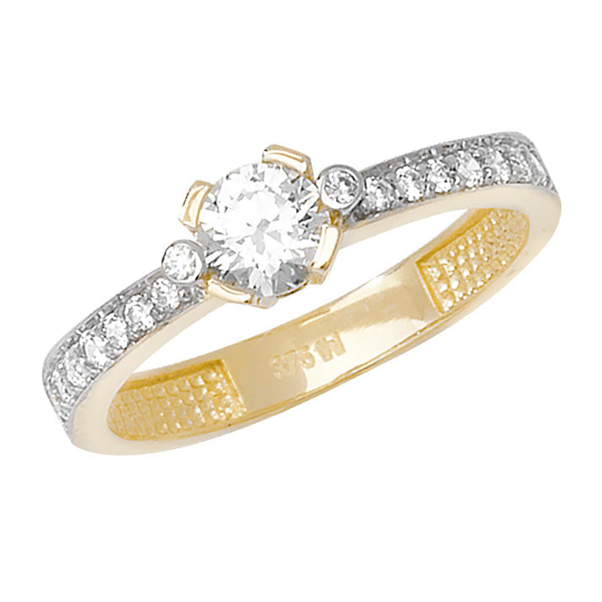 The 9CT LADIES CZ WHITE AND YELLOW GOLD ring features cubic zirconia stones and ribbon-shaped shoulders for an elegant look.
