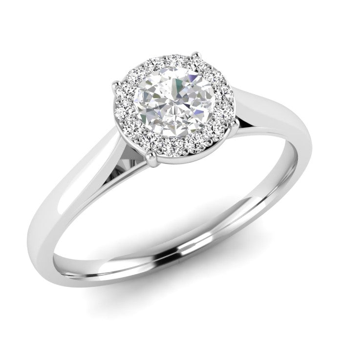 The 9ct White Gold Diamond Illusion Set Ring showcases a brilliant central diamond with a sparkling halo of smaller stones, all set on a sleek and polished band.