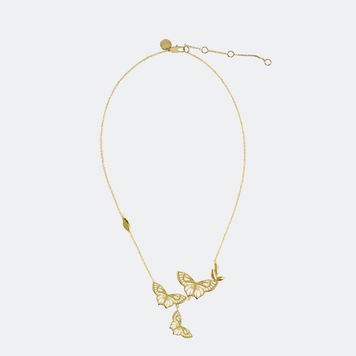The Sara Millar Kew Butterfly Necklace SAJ2002 features three butterfly-shaped pendants in 18ct gold plating with an adjustable clasp, shown on a plain light background. Part of the refined Kew Collection.