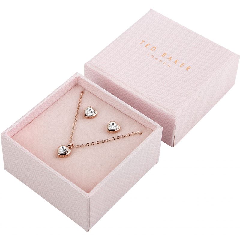 A TED BAKER Hadeya gift set (TBJ1943-24-02) with a rose gold Swarovski crystal heart pendant necklace and matching earrings, presented on a soft insert in a pink Ted Baker box.