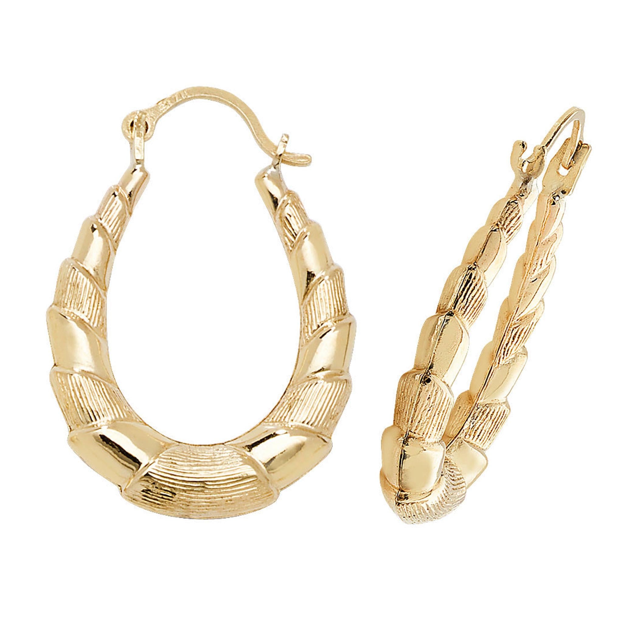 9ct gold ladies small oval ribbed creole hoop earrings featuring a textured, tapered design and secure latch-back closures.