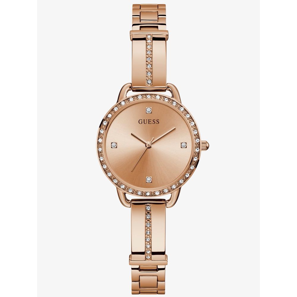 The Guess Ladies Bellini Rose Gold Tone Watch GW0022L3 features a round face, crystal indexes, and a bracelet-style band with embedded crystals.