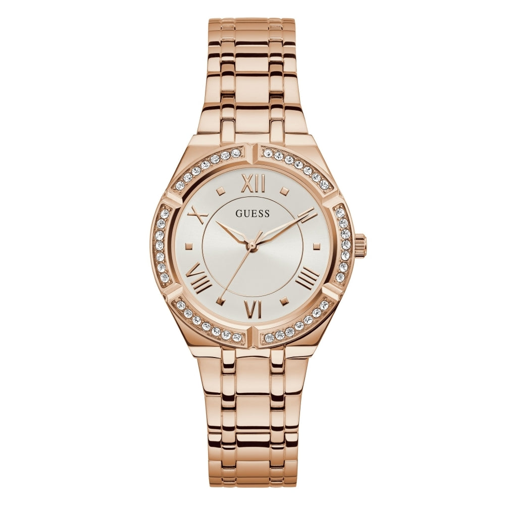 The Guess GW0033L3 Women's Cosmo Rose Gold Tone Watch features a metal link band, Roman numeral hour markers, and a bezel adorned with sparkling clear crystals.