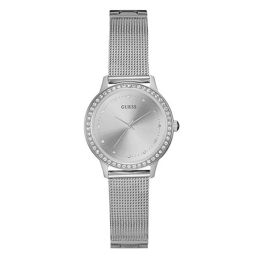 The Guess W0647L6 Chelsea Women's Silver Tone Watch features a stainless steel mesh strap, crystal-studded bezel, and a minimalist silver dial without numerals.