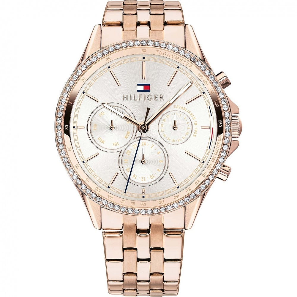 The Tommy Hilfiger 1781978 Ladies Ari Rose Gold-tone Bracelet Watch features a crystal-set bezel, metal link band, and quartz movement.