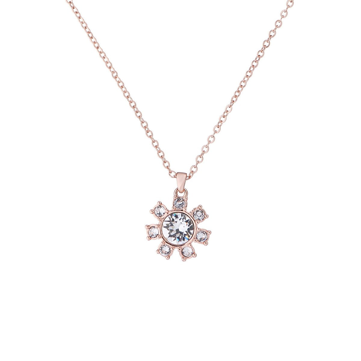 The Ted Baker Cressana TBJ2086-24-02 is a rose gold tone necklace featuring a daisy clockwork pendant adorned with clear crystals.
