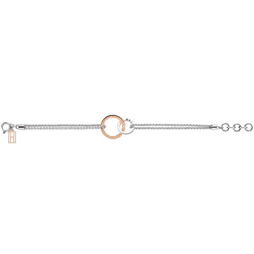 The Tommy Hilfiger Ladies Two Colour Open Circle Bracelet 2780002 features a rose gold plated and silver interlocking circle, double silver chains, and an adjustable clasp—a stylish choice for any occasion.