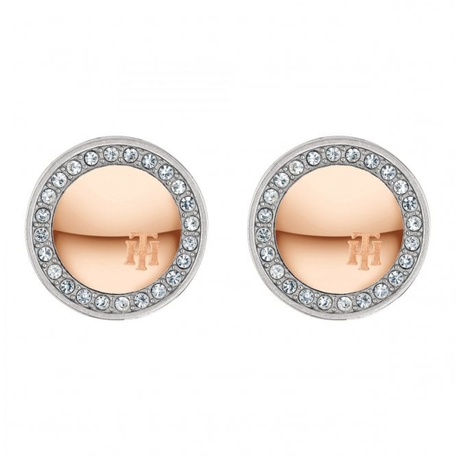 TOMMY HILFIGER JEWELLERY Rose Gold Tone Stone Set Stud Earrings 2780185 feature round rose gold studs engraved with "TH," surrounded by sparkling clear crystals for an elegant look.
