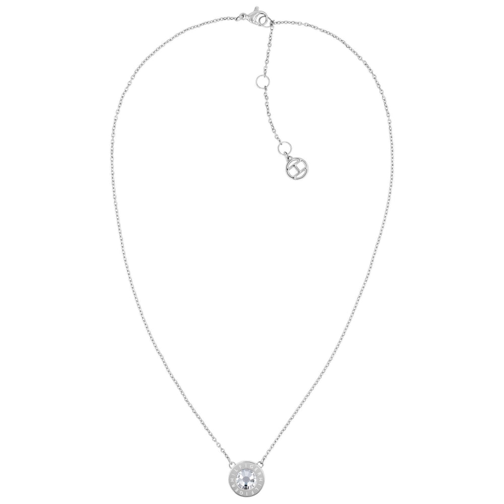 The TOMMY HILFIGER Ladies Silver Tone Stainless Steel Crystal Necklace 2780284 features a round clear crystal pendant and an adjustable clasp.