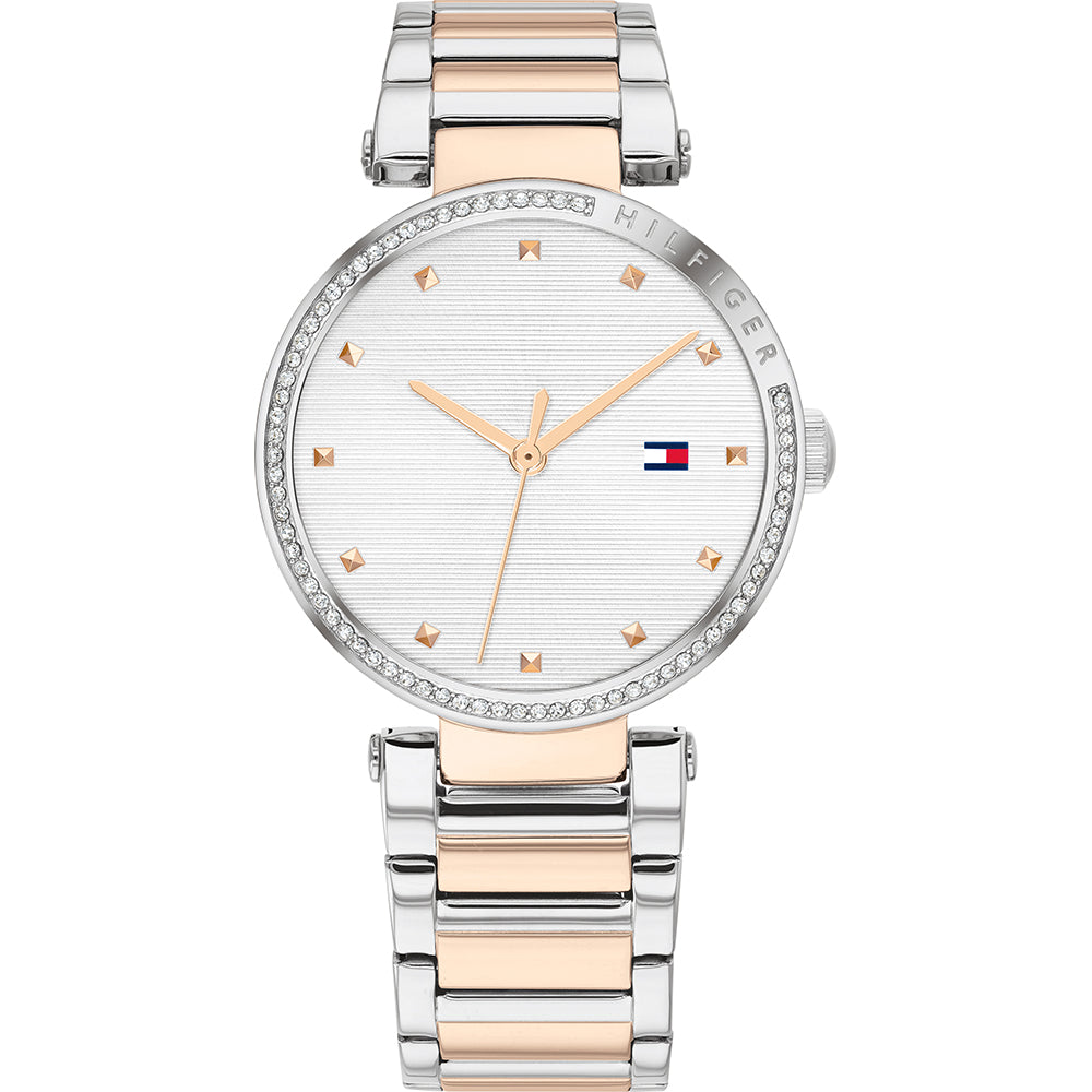 The Tommy Hilfiger 1782236 Lynn Watch showcases a two-tone silver and rose gold band, a crystal-accented bezel, and a minimalist white dial with gold hour markers and the iconic Tommy Hilfiger logo.