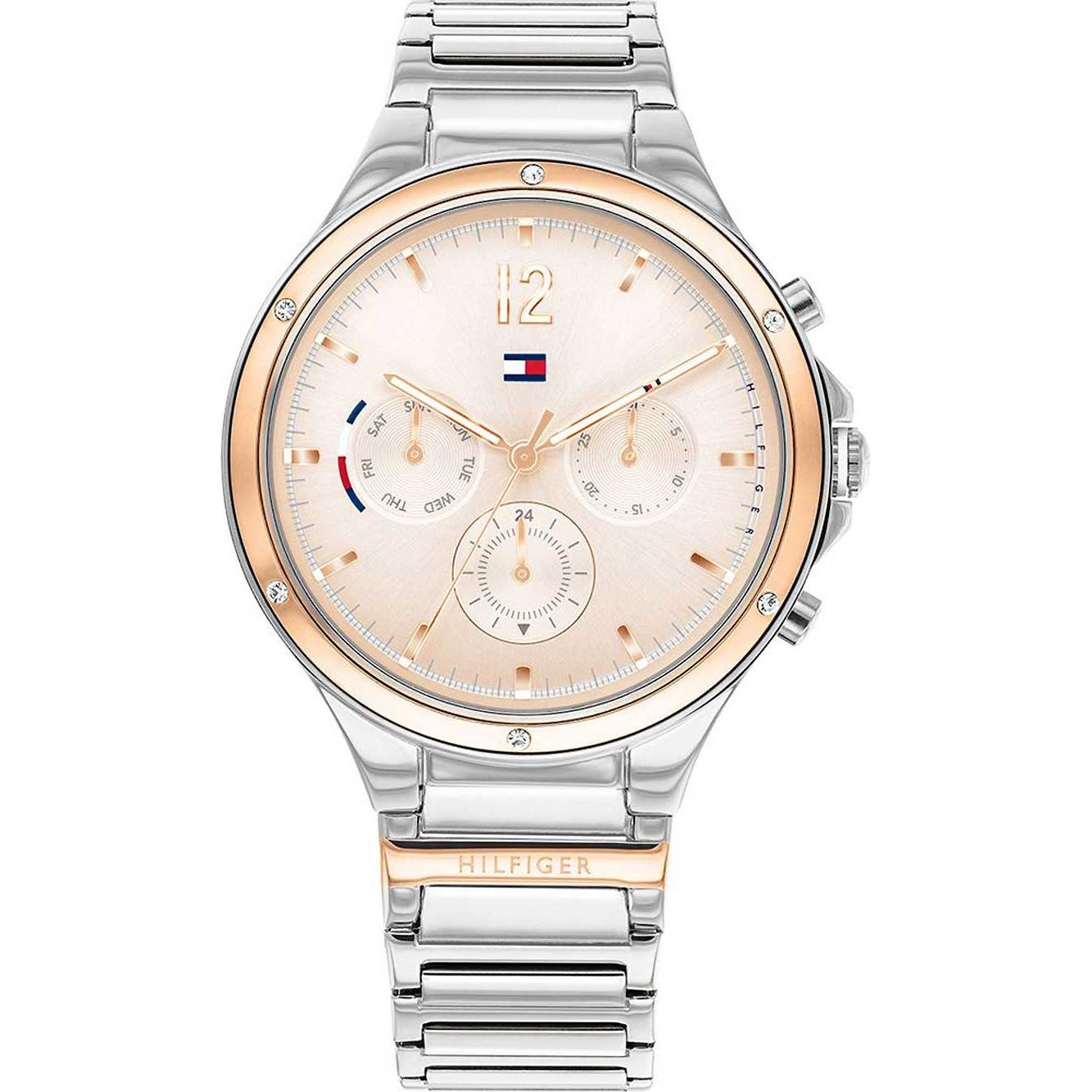 The Tommy Hilfiger 1782279 Ladies Eve Silver tone Bracelet Watch features a round dial, three subdials, a metal link band, and a crystal-set bezel for extra elegance.