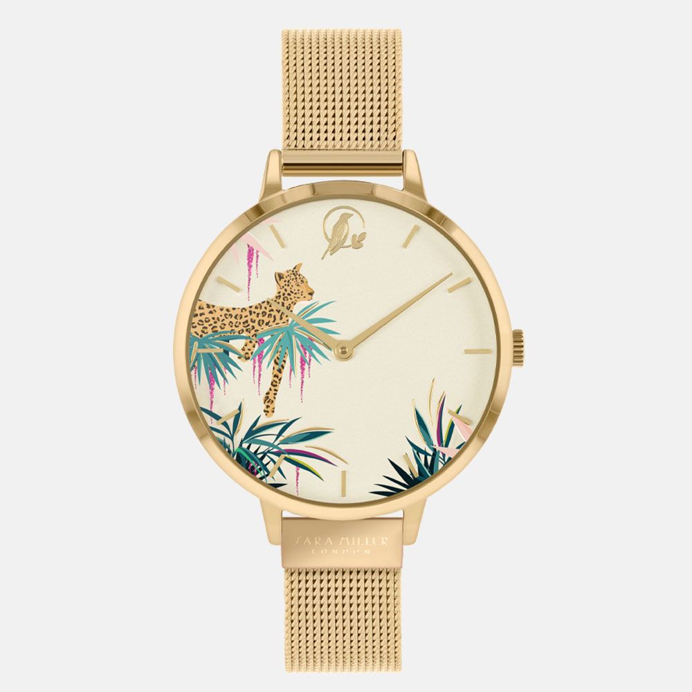 The Sara Miller Wisteria SA2044 watch features a gold-plated case, a cream-colored face with leopard and tropical leaves illustration, and is complemented by a stylish mesh band.