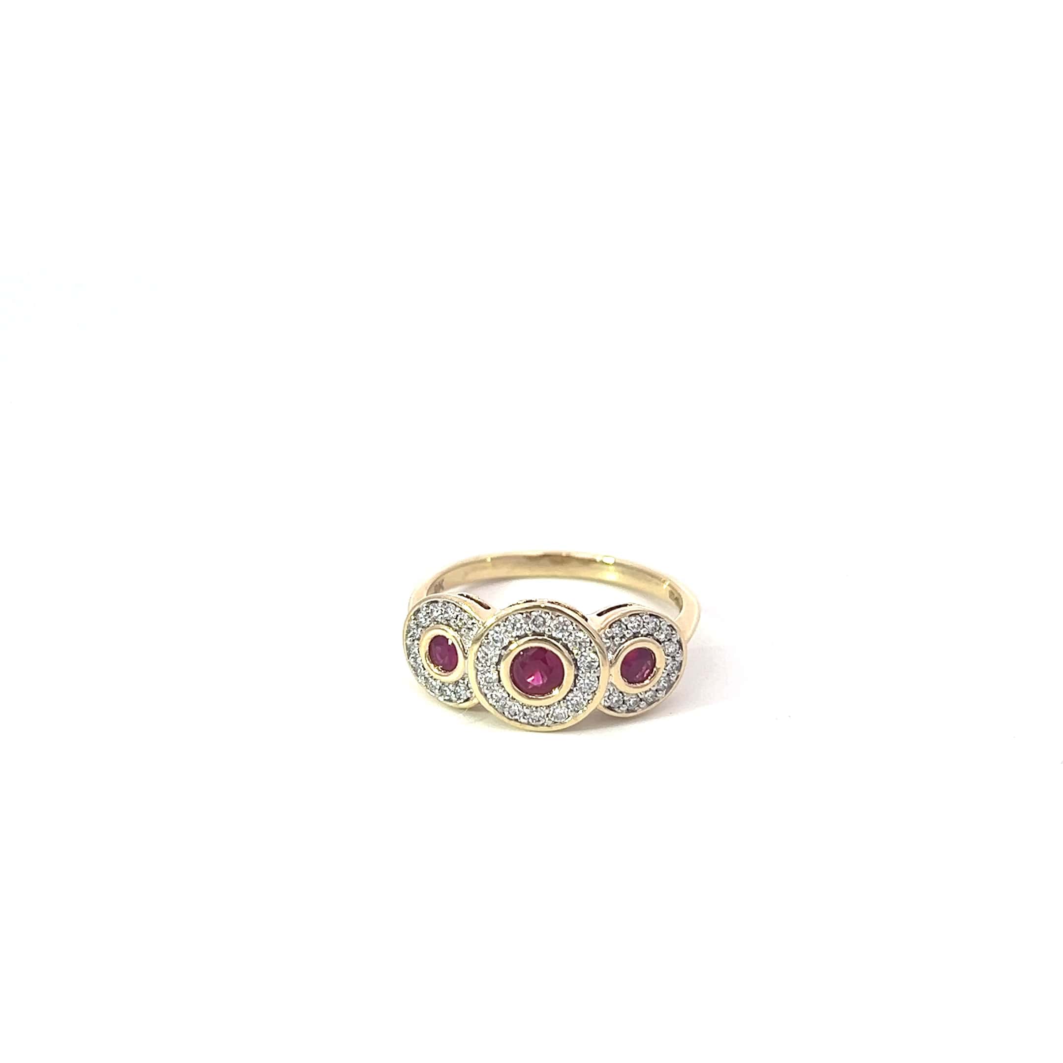 Gold ring with red gemstones on a white background