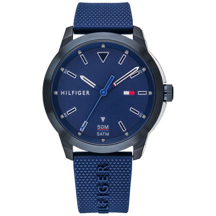 The Tommy Hilfiger Blue Silicone Men's Watch - 1791621 features a textured strap, analog display, and 50M (5ATM) water resistance.