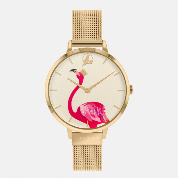 The Sara Miller FLAMINGO GOLD MESH WATCH SA4056 features a gold mesh strap, white face, minimalist gold hour markers, and a crowned pink flamingo illustration—a signature design from the Piccadilly Collection.