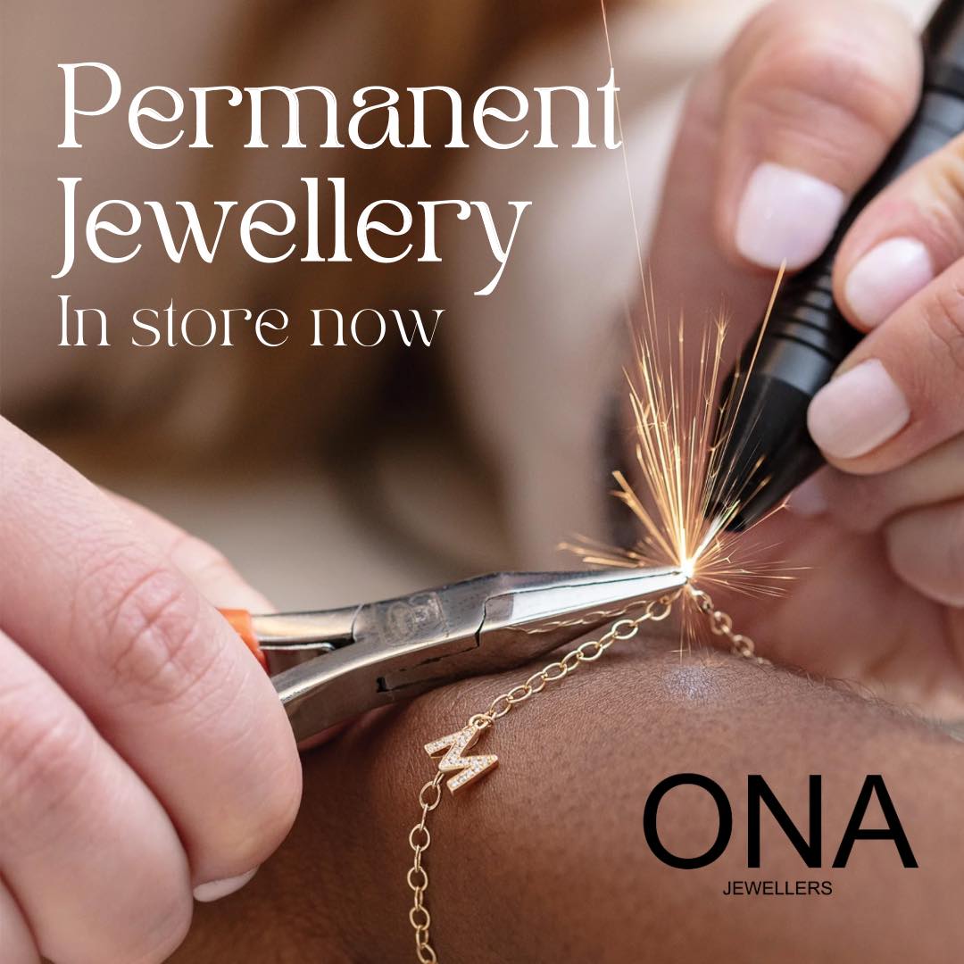 Close-up of a jeweller welding a bracelet onto a person's wrist with sparks flying, text reads "Permanent Jewellery In store now" and "ONA Jewellers.