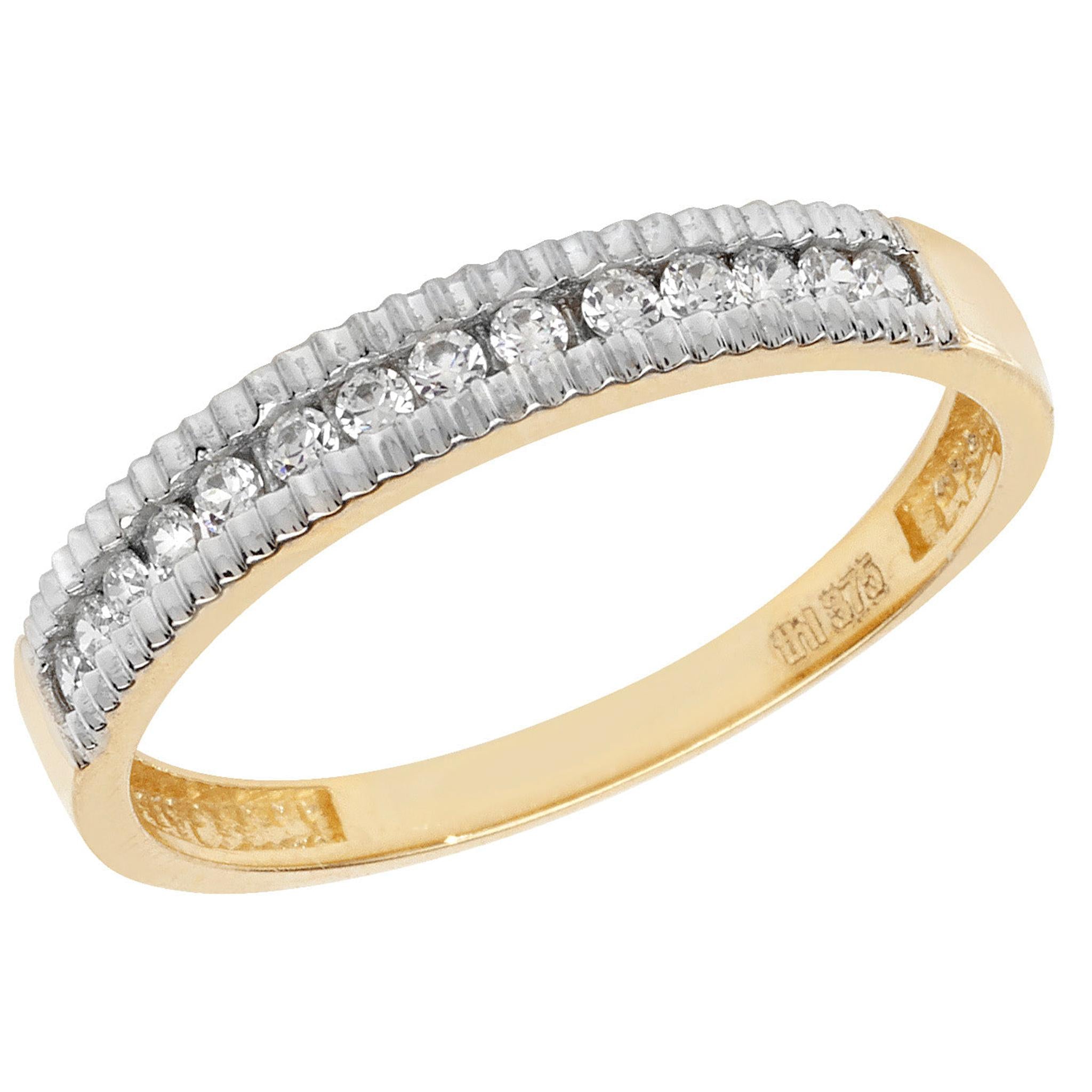 The 9CT GOLD CUBIC ZIRCONIA ETERNITY RING features two rows of small baguette-cut stones and a central row of round-cut CZs in a channel setting, making it an elegant ladies’ ring.