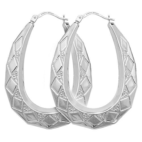 The STERLING SILVER X/LARGE OVAL HARLEQUIN CREOLE EARRINGS feature diamond-shaped engravings, adding a modern twist and elegant shine to any look.