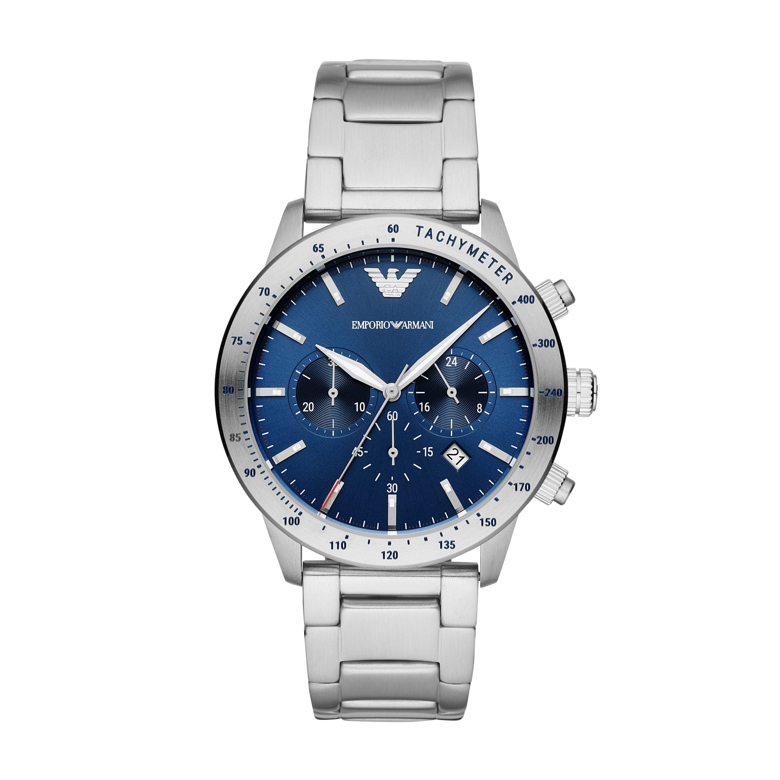 The EMPORIO ARMANI AR11306 Gents Mario Chronograph features a silver stainless steel bracelet, blue dial with three subdials, date window, and the signature Emporio Armani logo at 12 o’clock.