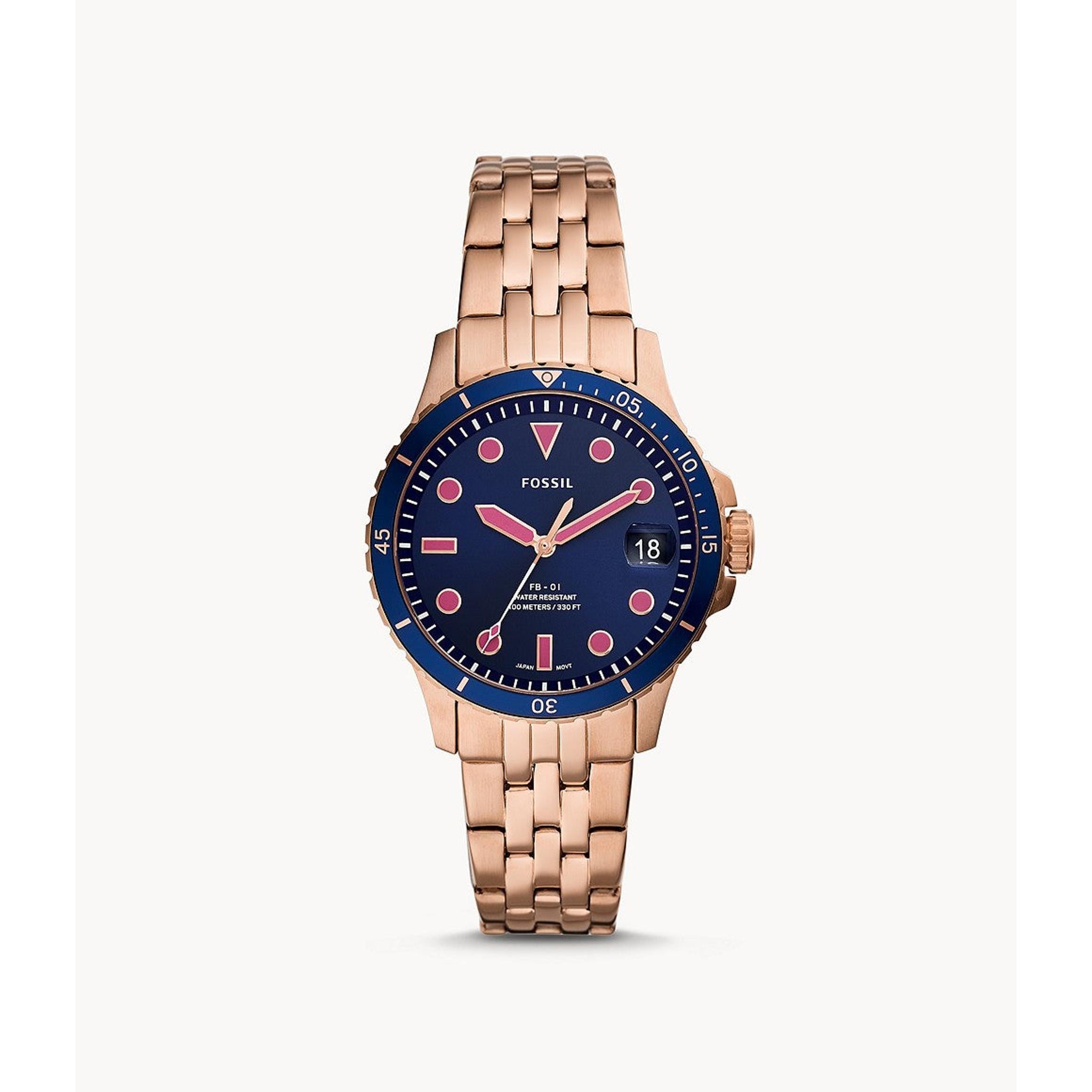 The Fossil ES4767 Ladies FB-01 features a rose gold tone bracelet, navy dial with pink hour markers, date display at 3 o'clock, and is shown on a plain white background.