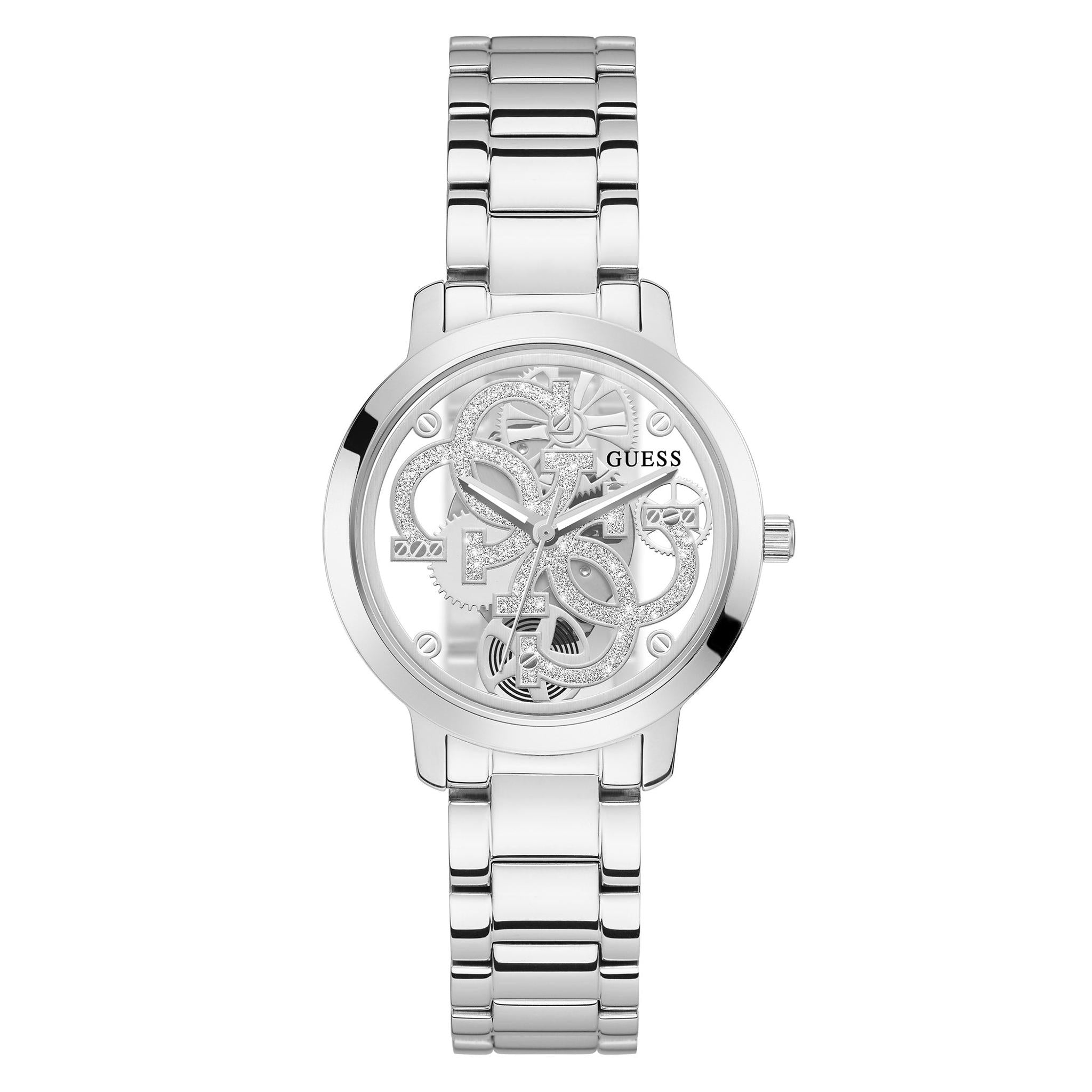 The Guess GW0300L1 Ladies Silver Tone Quattro Clear Watch features a metal link band and a transparent skeleton dial showing exposed gears and mechanical components.