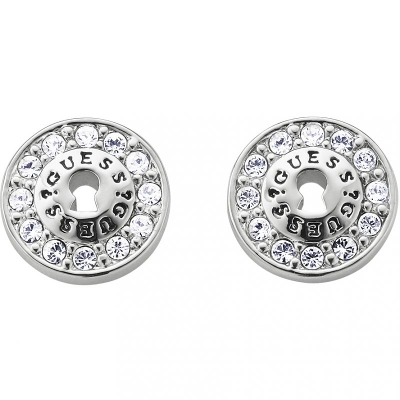 A pair of Guess All Locked Up Rose Gold Earrings (UBE71331) with a stud design, featuring clear rhinestones and "GUESS" engraved around the center.