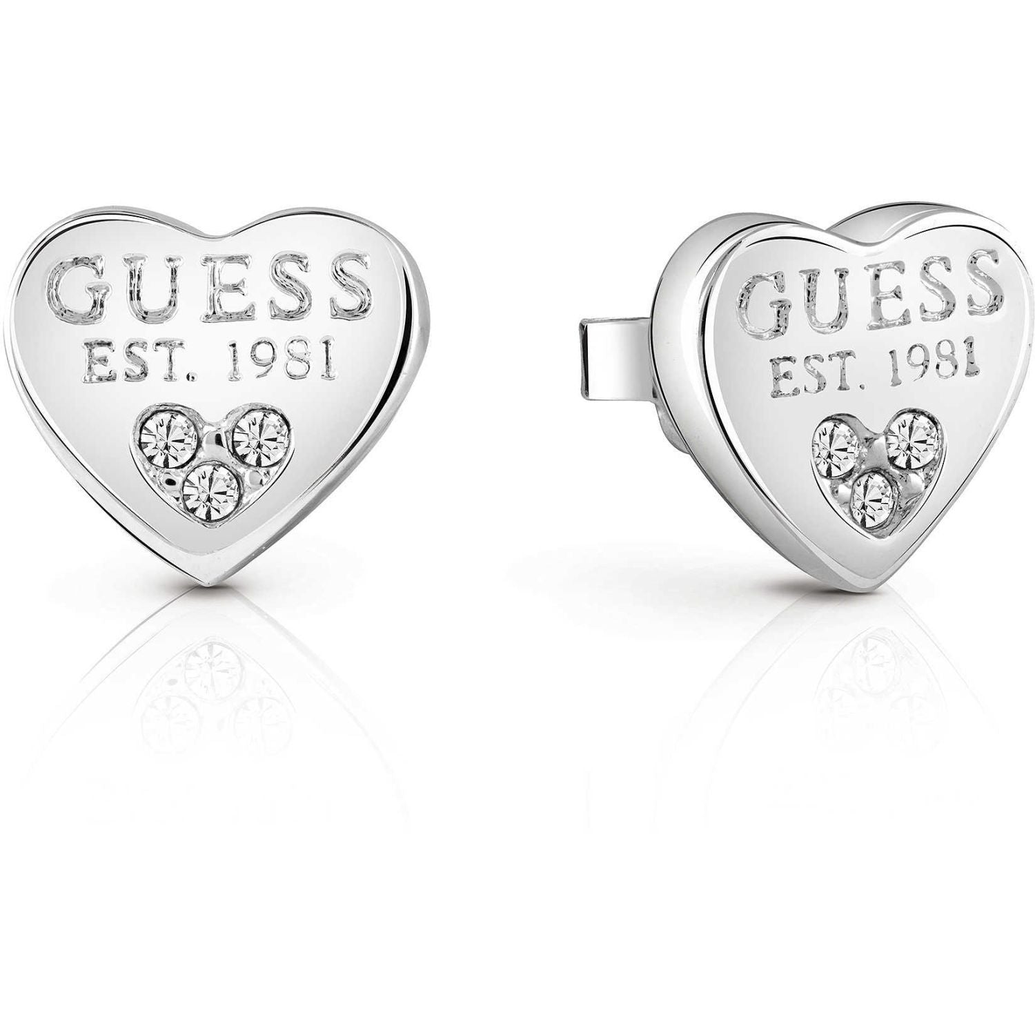 Guess Ladies All About Shine Silver Plated Crystal Heart Stud Earrings (UBE82082A) feature "GUESS EST. 1981" engraving and three sparkling Swarovski crystals on each rhodium-plated earring.