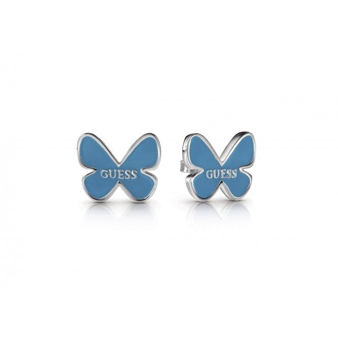 The GUESS UBE85082 Tropical Dream earrings feature blue enamel butterfly studs with a rhodium-plated finish and the word "GUESS" for added style.