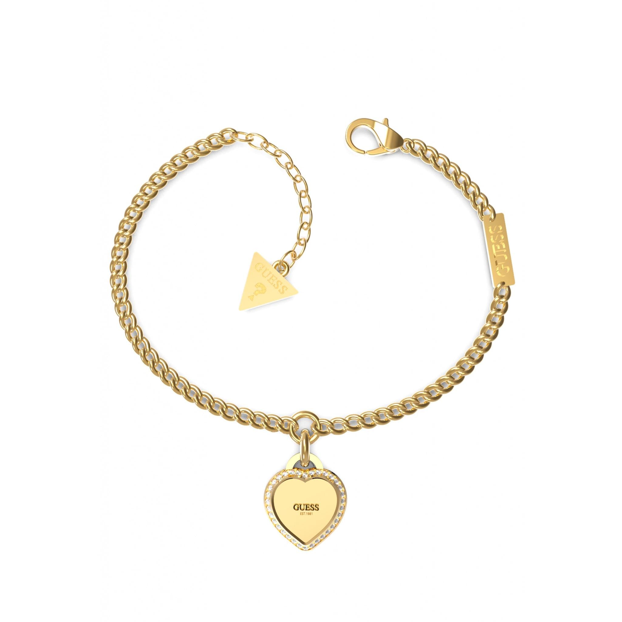 Guess Women’s Fine Heart Gold Tone Stainless Steel Bracelet UBB01422YGL features a heart-shaped "GUESS" charm, triangular tag, and secure lobster clasp closure.