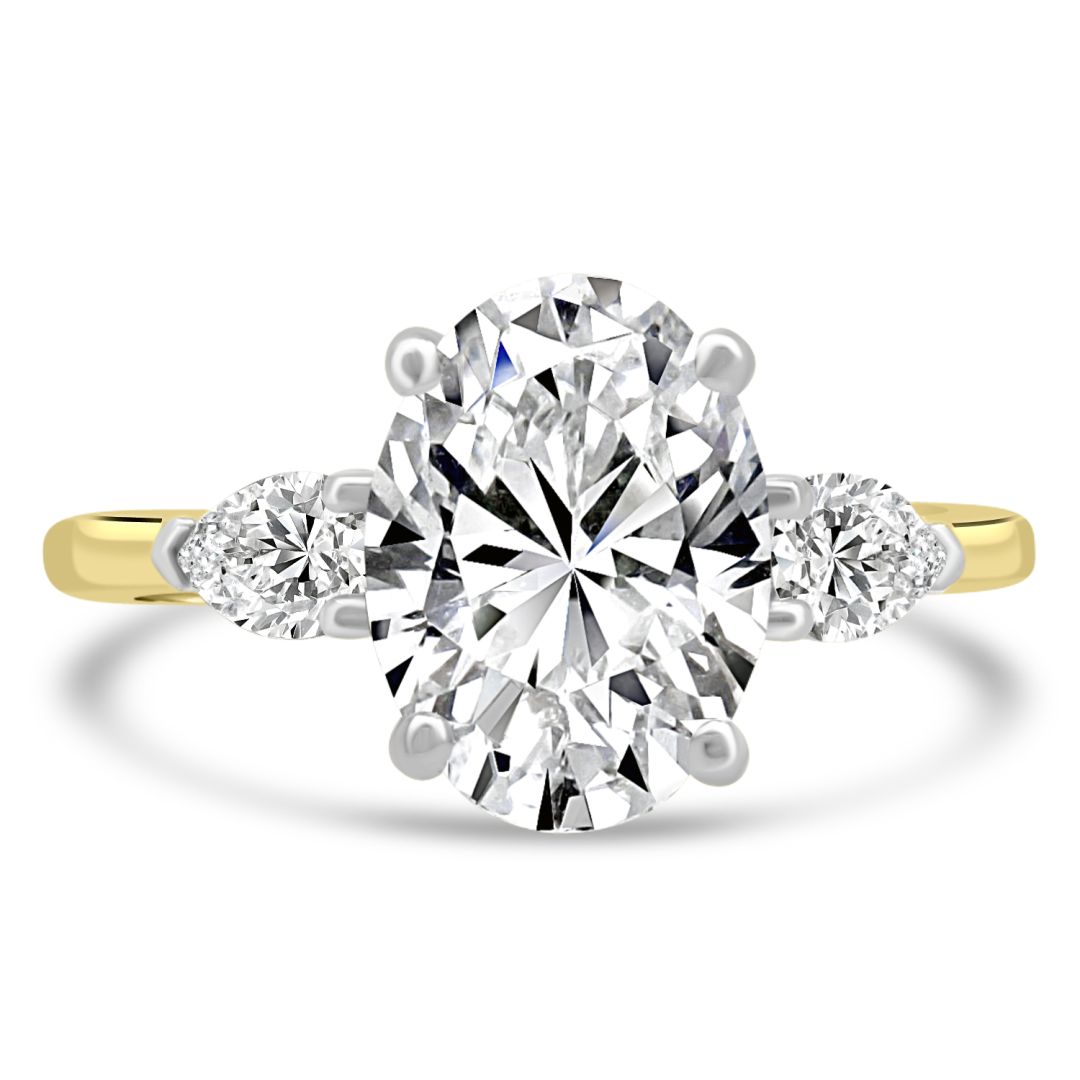 Diamond ring with gold band on a white background