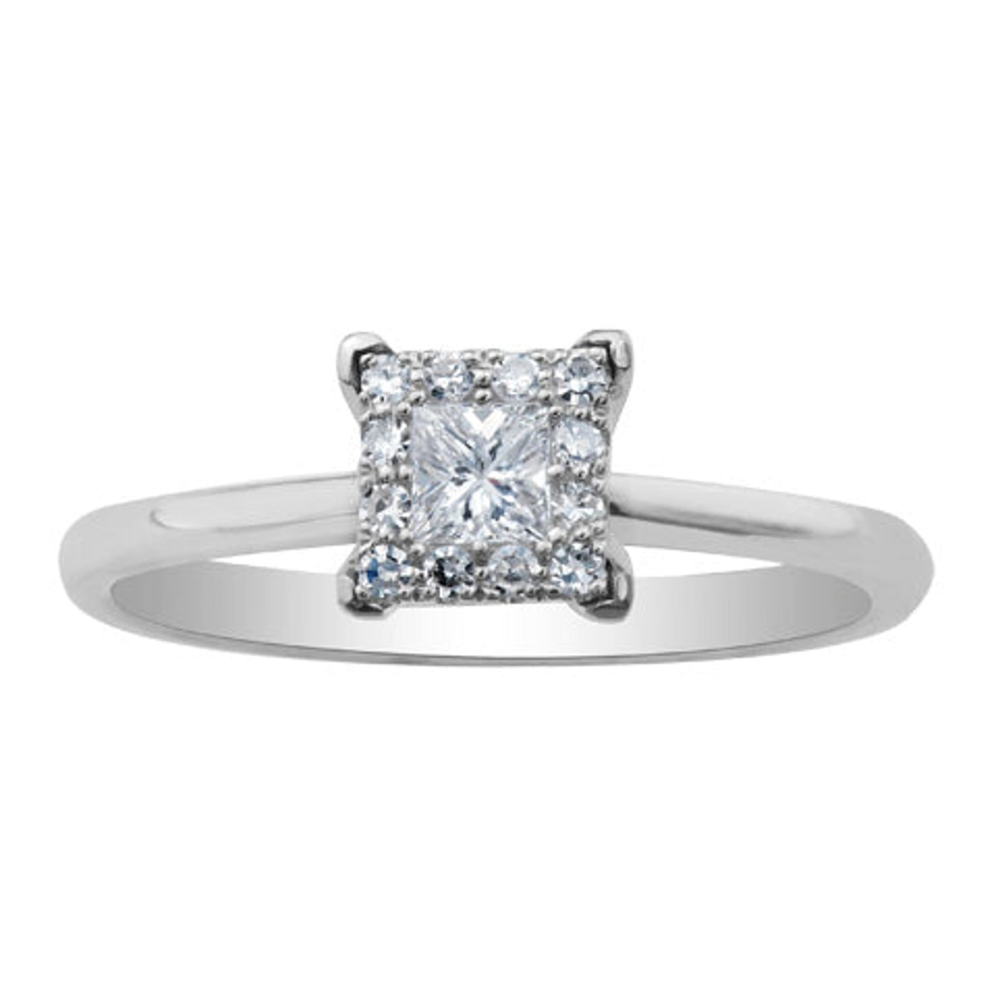 The 9ct White Gold Princess Cut Ring 0.35ct showcases a square solitaire princess cut diamond with a sparkling halo of smaller diamonds, all set on a plain white gold band.