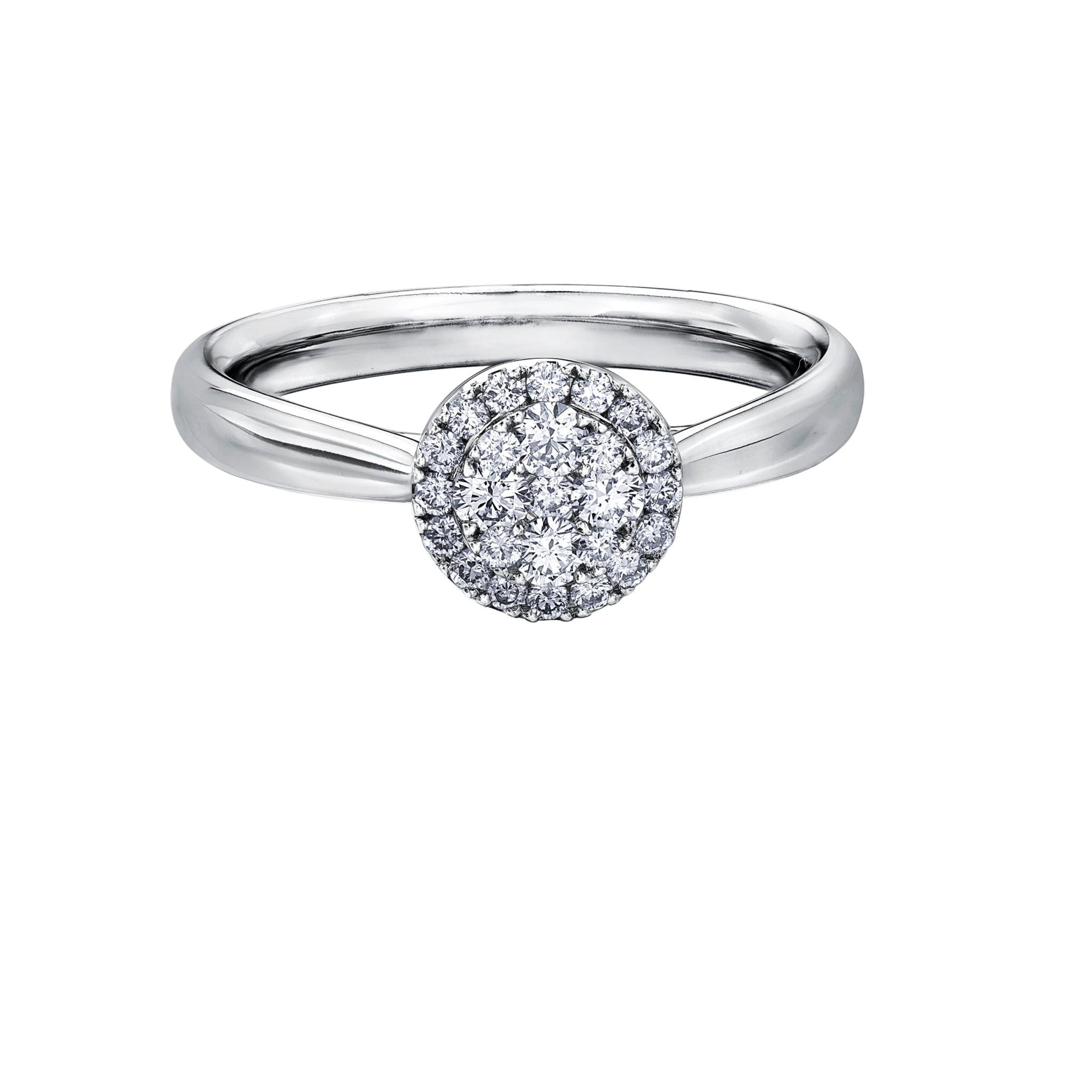 The 9ct White Gold Starburst Diamond Ring 0.33ct features a round starburst setting of sparkling diamonds on a sleek, polished white gold band.