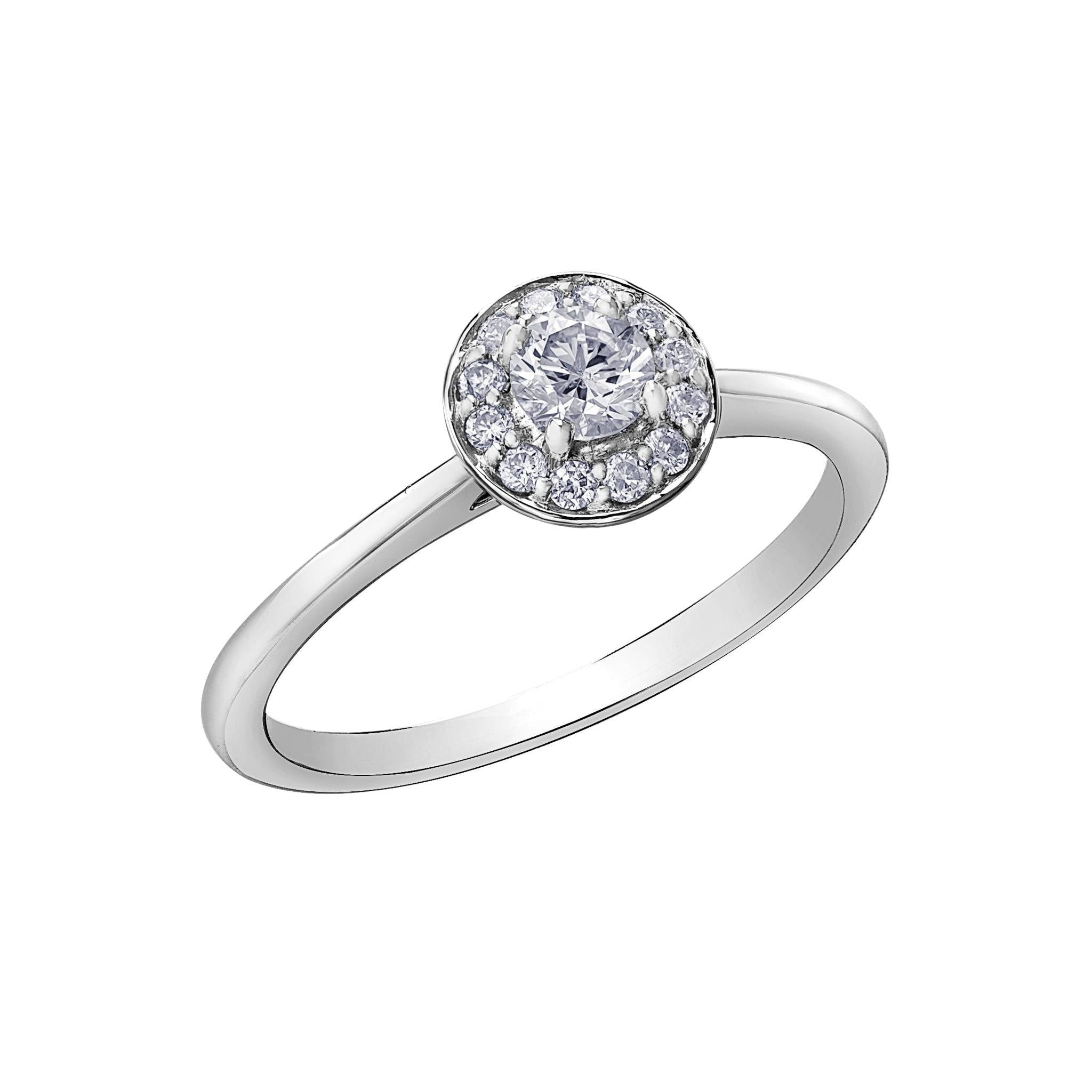 The 9ct White Gold Diamond Halo Ring 0.35ct showcases a round diamond surrounded by sparkling accents, all set in polished white gold.