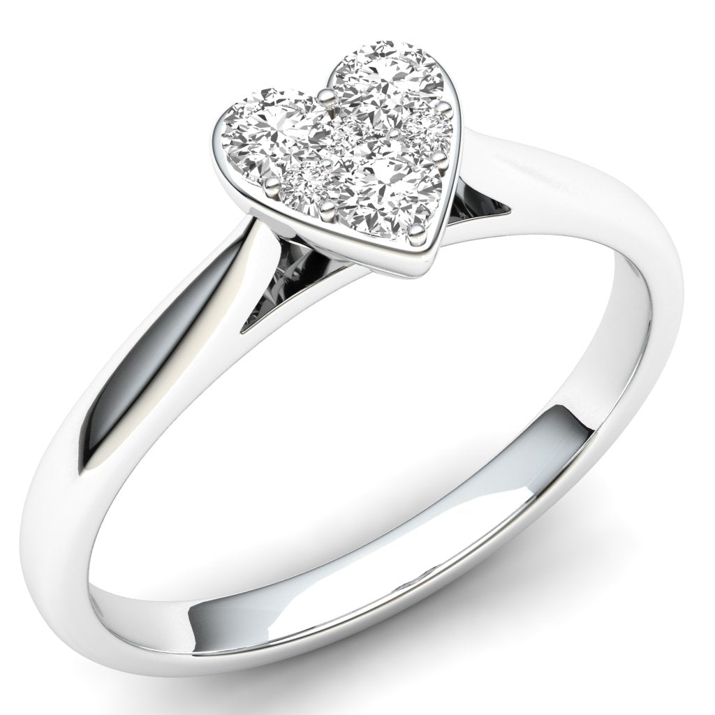 The 9ct White Gold Heart shape Diamond Ring 0.25ct features a heart-shaped cluster of brilliant cut diamonds set on the band.