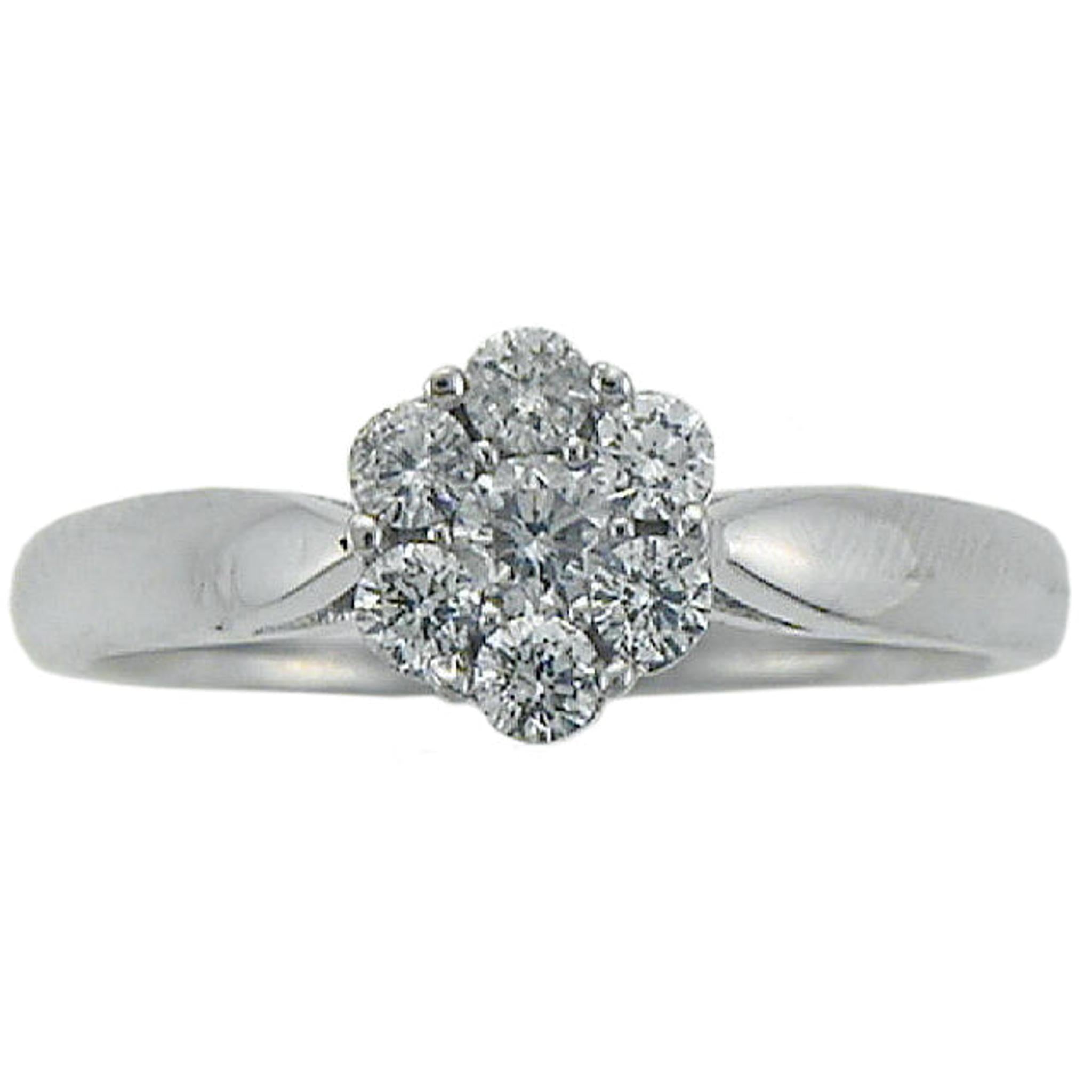The 9ct White Gold Diamond Daisy Cluster Ring 0.50ct features seven round diamonds arranged in a flower shape on a sleek white gold band.