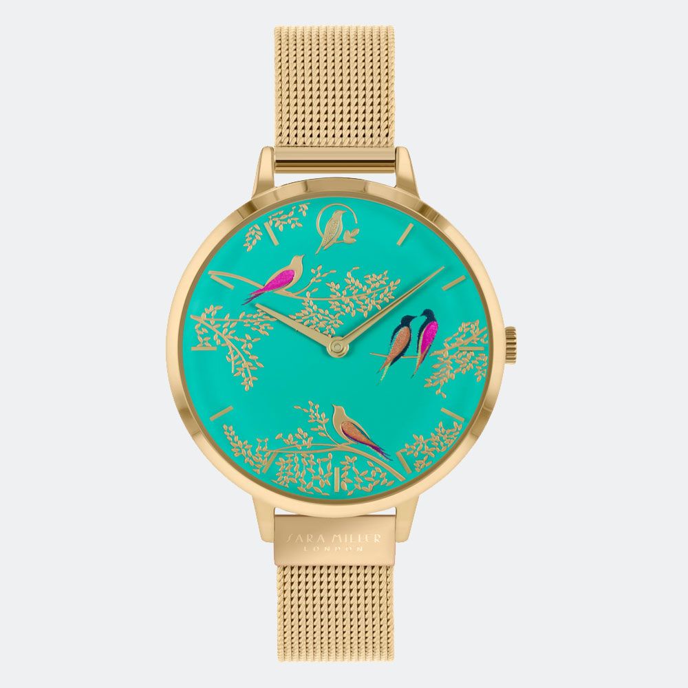The SARA Miller Green Birds Mesh Watch SA4008 features a gold mesh strap and green face adorned with colorful birds and branches—a signature Sara Miller London style.