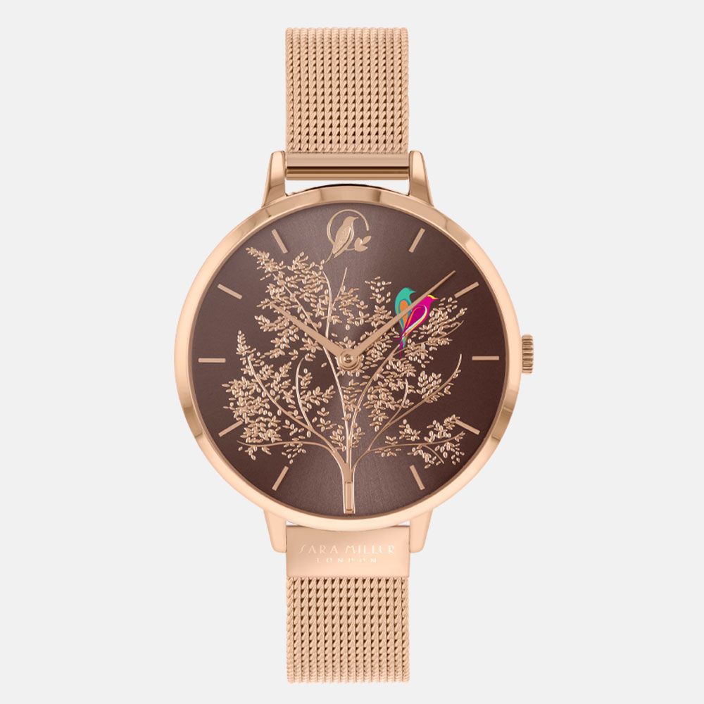 The SARA Miller Love Birds Rose Gold Mesh SA4086 features a brown face with a tree design, pink and green hands for added charm, and an elegant rose gold mesh strap from the Chelsea Collection.
