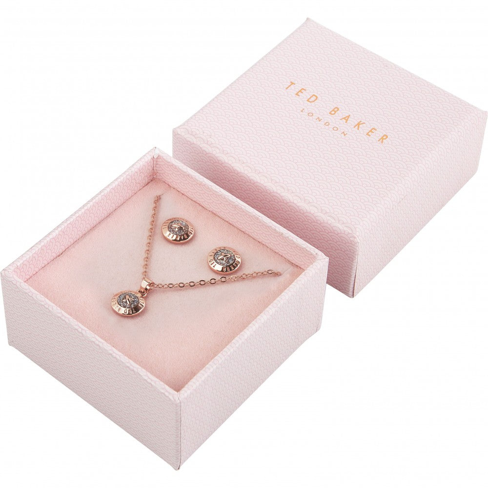 The TED BAKER Emillia Rose Gold Finish Button Pendant and Earring Gift Set TBJ1946-24-138 features a matching necklace and earrings with round crystal accents, presented in a pink Ted Baker box.