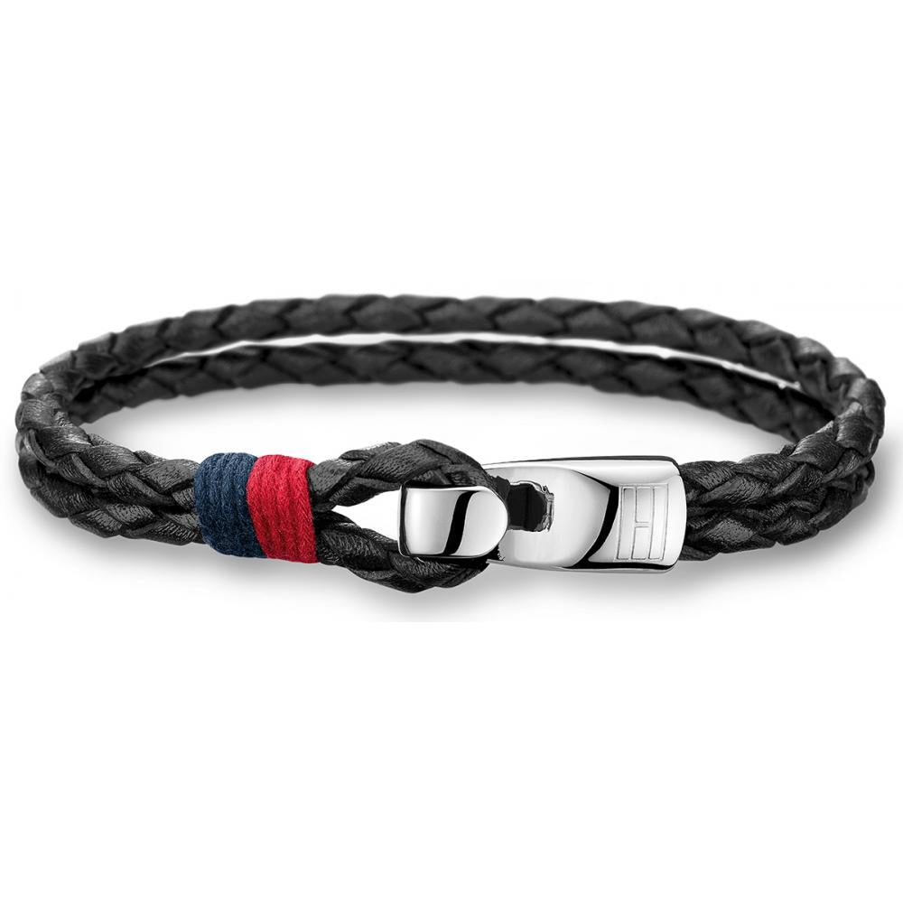 The TOMMY HILFIGER JEWELLERY Men's Double Row Leather Bracelet 2700670 features a black braided leather double strand, silver clasp, and red and blue thread accents, capturing the signature Tommy Hilfiger style.