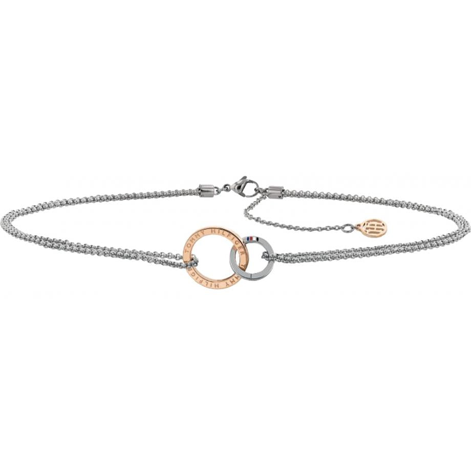 The Tommy Hilfiger Two Tone Ladies Open Circle Choker Necklace 2780016 features interlocking rose gold and silver rings with engraved Roman numerals on an adjustable stainless steel chain.
