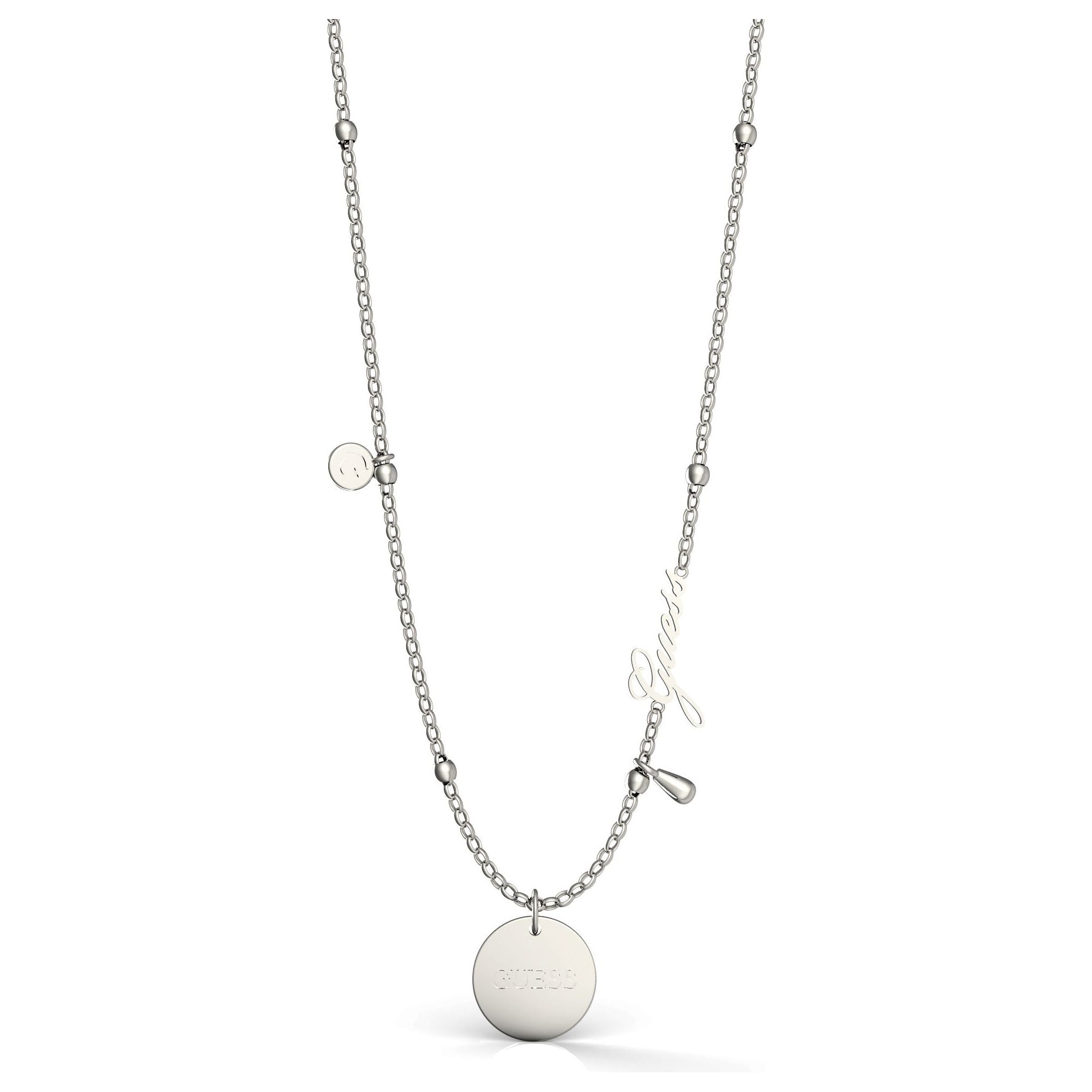 The Guess Peony Art Stainless Steel Charm Necklace UBN29101 features a thin stainless steel chain with a round engraved pendant, small disc, cursive Guess logo charm, and a teardrop-shaped detail.