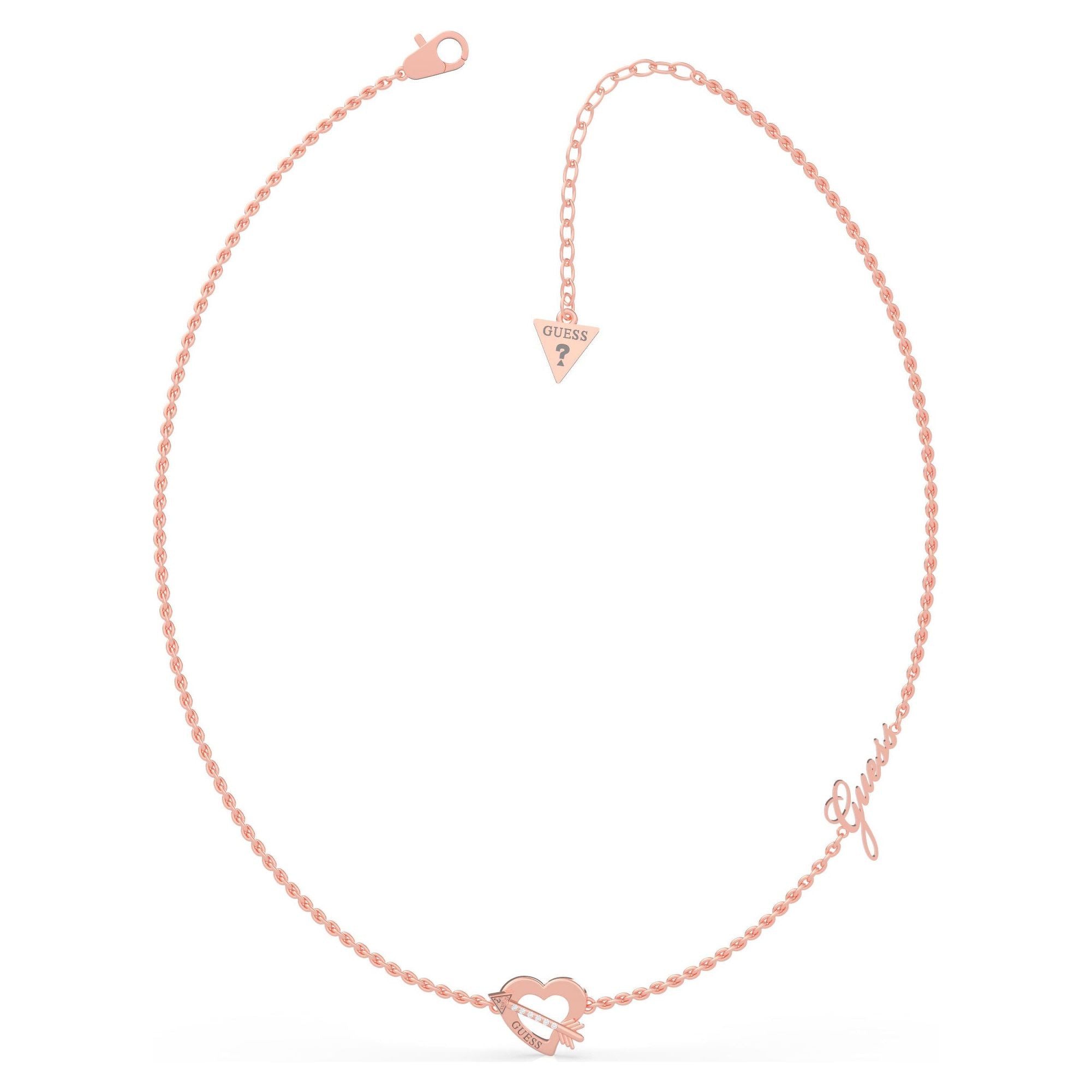 The Guess UBN79061 Ladies Rose Gold Tone Across My Heart Necklace features a heart and arrow pendant with Swarovski crystals, an adjustable clasp, and "Guess" in cursive on the side.