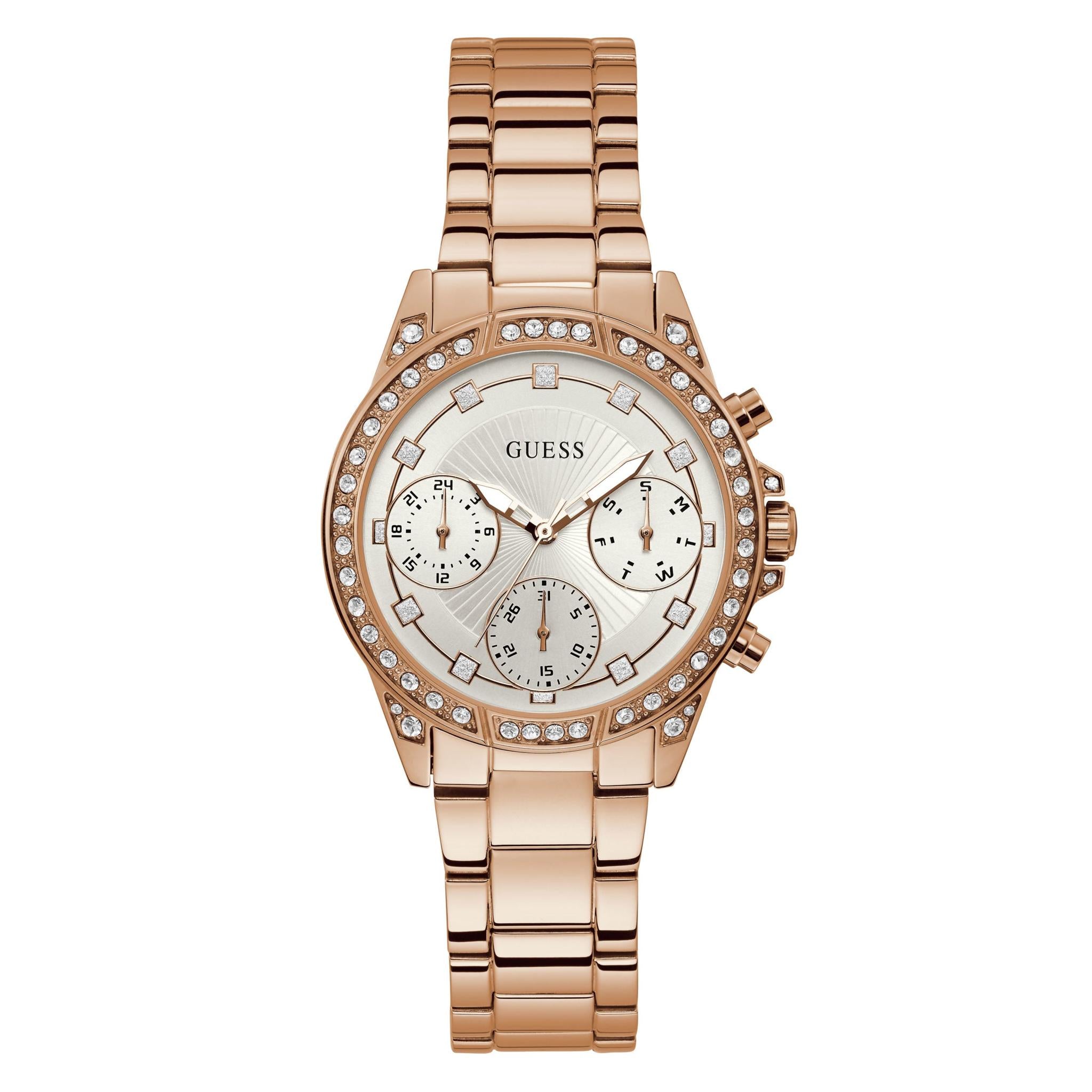 The GUESS Ladies' Rose Gold Tone Gemini Bracelet Watch W1293L3 features a metal link bracelet, crystal-studded bezel, three subdials, and a silver-tone face with the Guess logo.