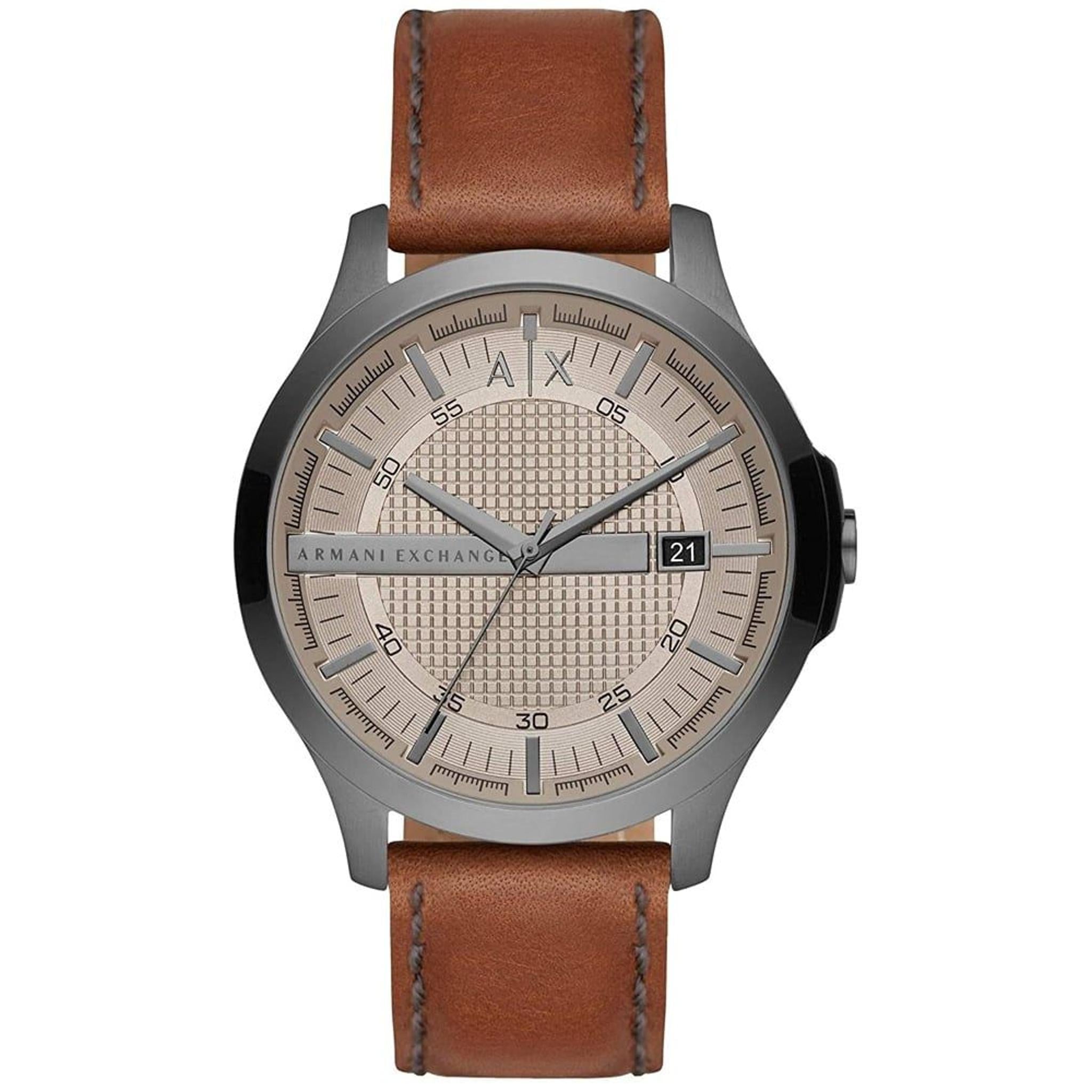 The Armani Exchange AX2414 Men's Hampton Watch features a round beige dial with silver indices, date display, iconic branding, and a brown leather strap. The stainless steel case adds durability and style.