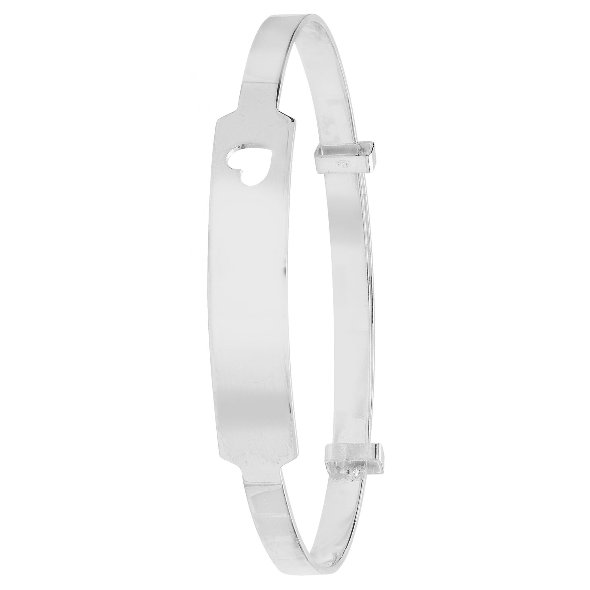 The Sterling Silver Baby Bangle with Cut Out Heart features an adjustable design and charming heart-shaped cutout, making it a perfect christening gift.