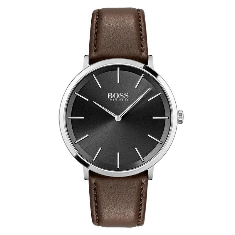 The Hugo Boss Classic Silver Tone Brown Leather Men's Watch - 1513829 features a black dial with silver hour markers, a brown leather strap, and "Hugo Boss" branding on the face.