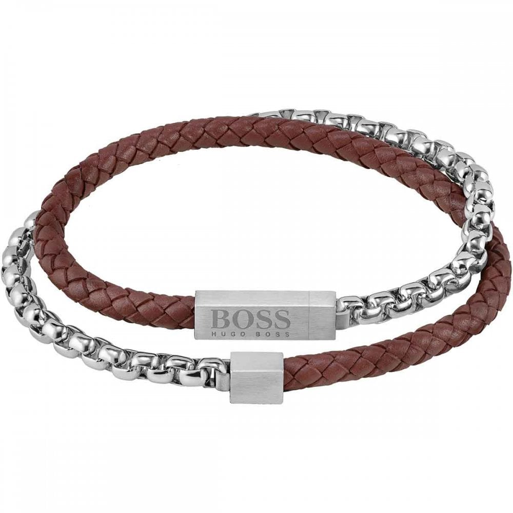 The Hugo Boss Gent's 1580149M Blended Brown Leather and Steel Double Bracelet features a braided brown leather band, silver-tone chain, and a rectangular clasp engraved with the Hugo Boss logo.