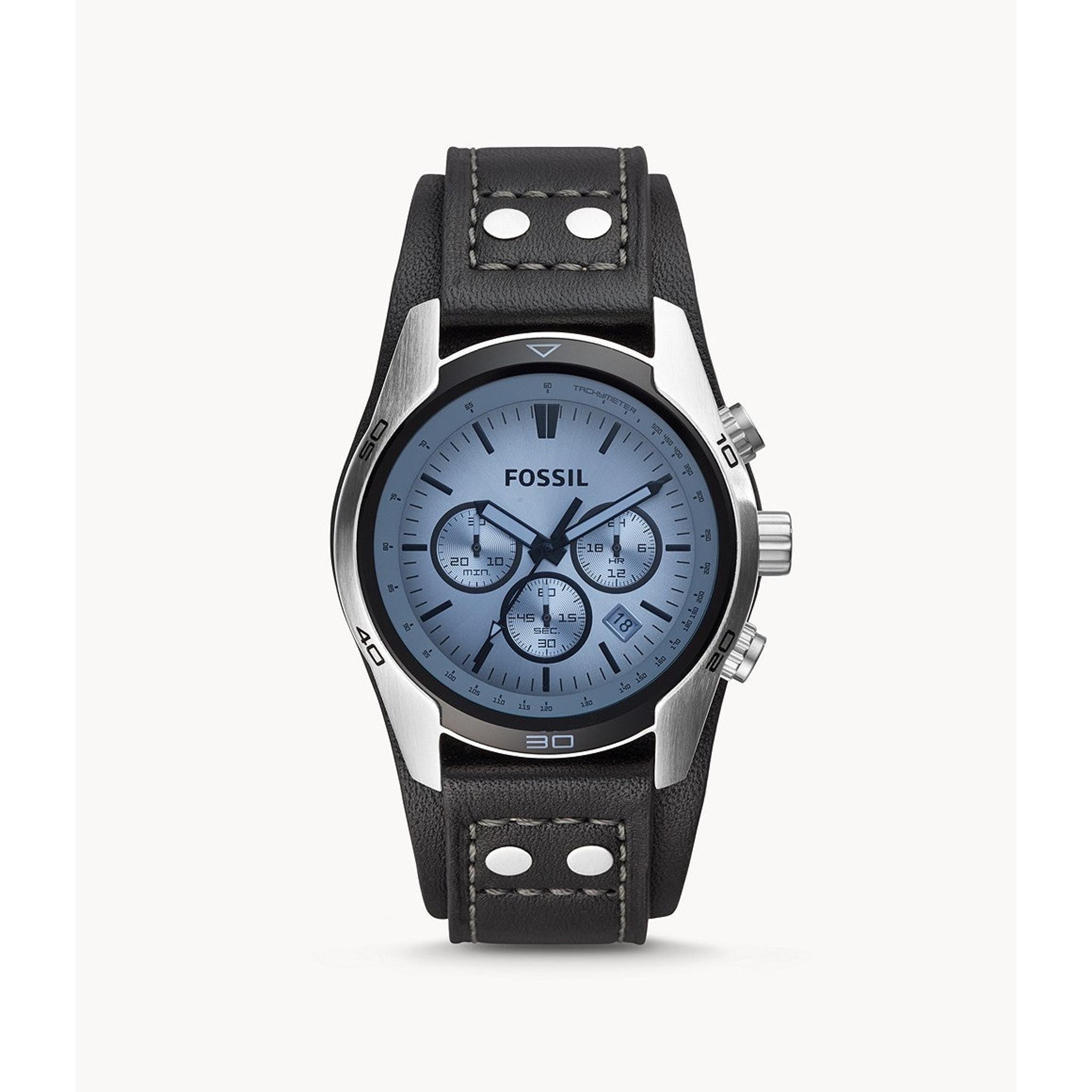 The Fossil Coachman Chronograph Cuff Strap Watch CH2564 features a blue dial, black leather cuff strap with metal rivets, silver-tone case, and includes date and stopwatch functions.