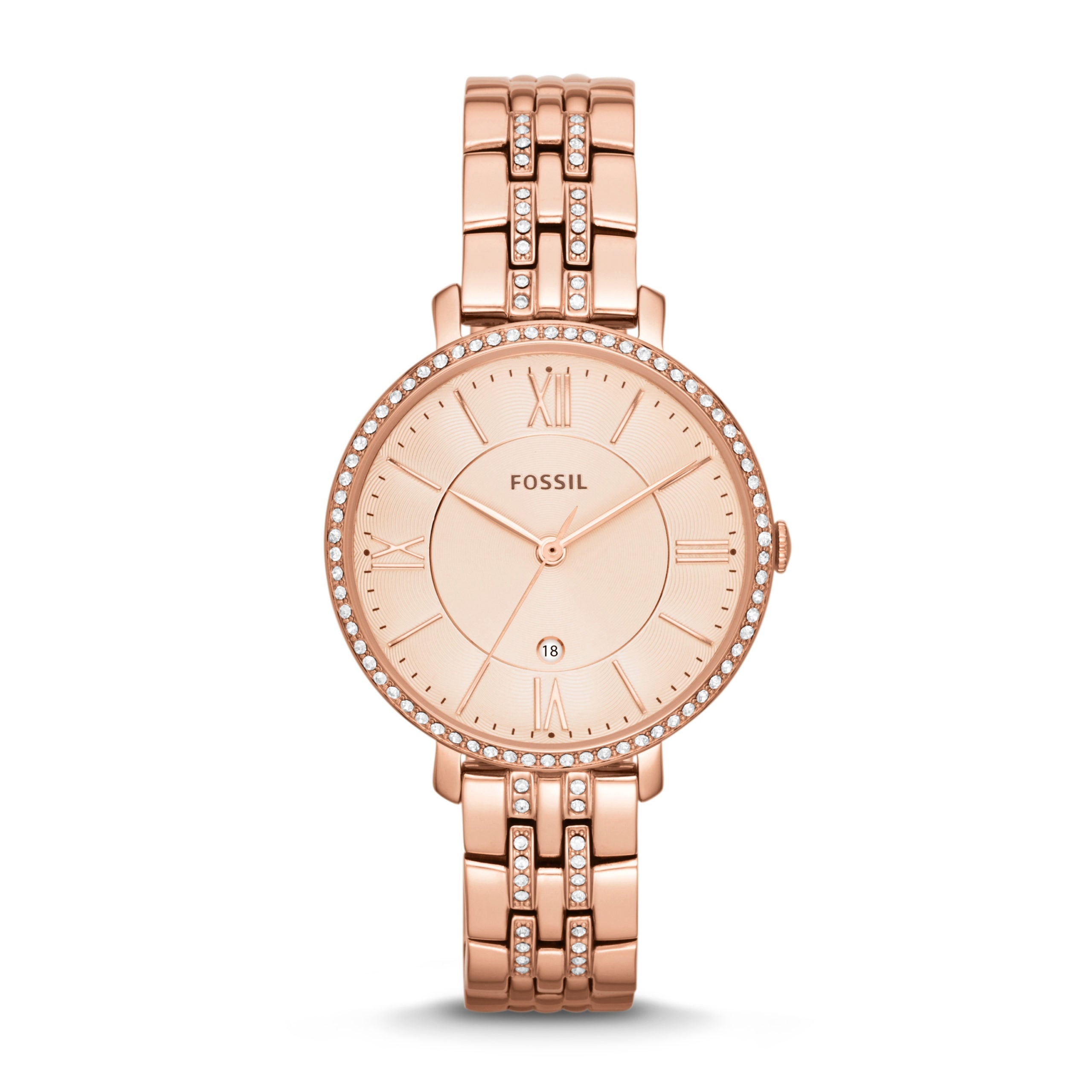 The Fossil ES3988 Ladies Jacqueline Rose Gold Tone Date Watch features a round face, Roman numerals, date display, and a rose gold-tone metal band with crystal accents.