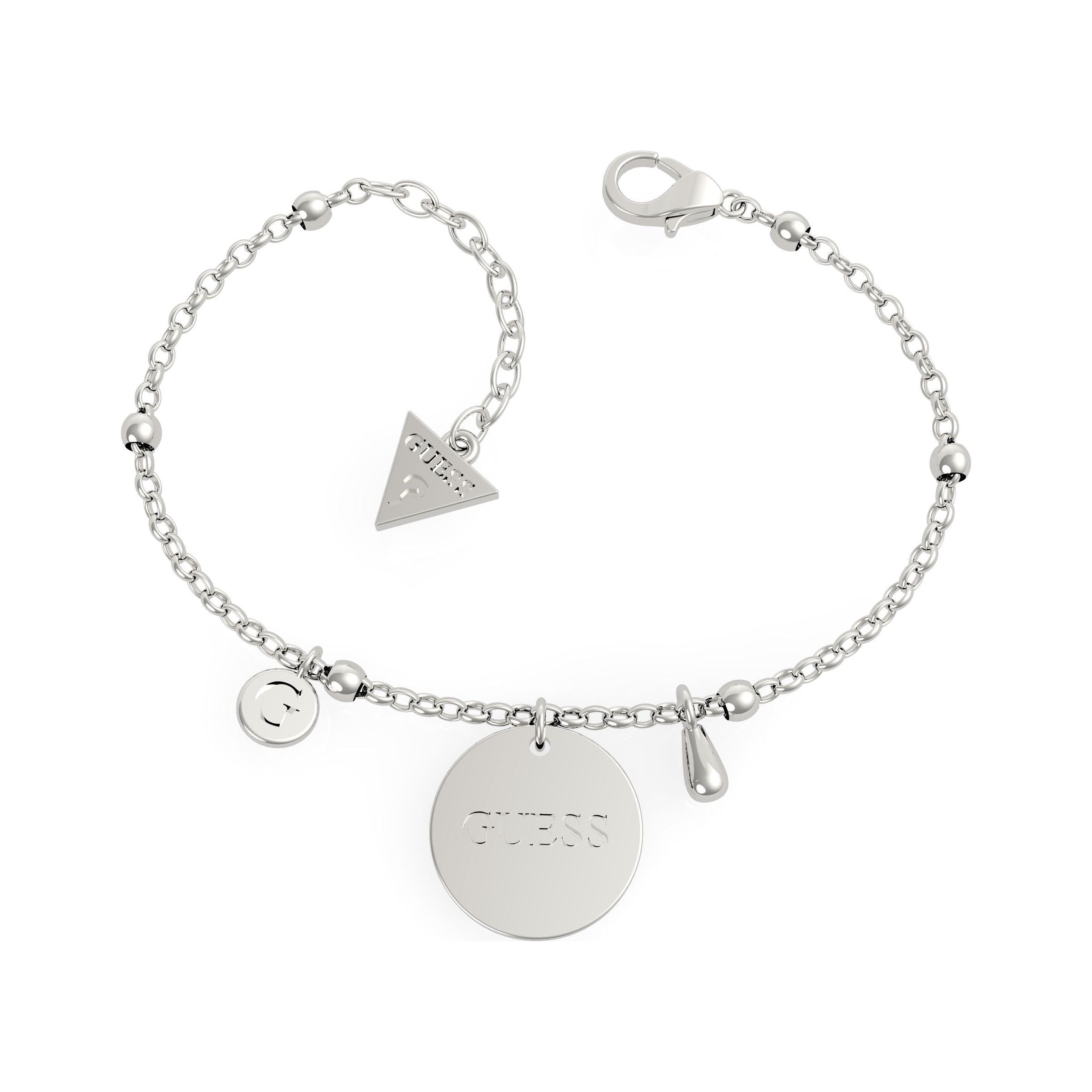 The Guess Peony Art Silver Tone Stainless Steel Coin Bracelet UBB29117-L features a silver stainless steel chain with a round "GUESS" disc, a triangle charm, a small round charm, and an adjustable lobster clasp.